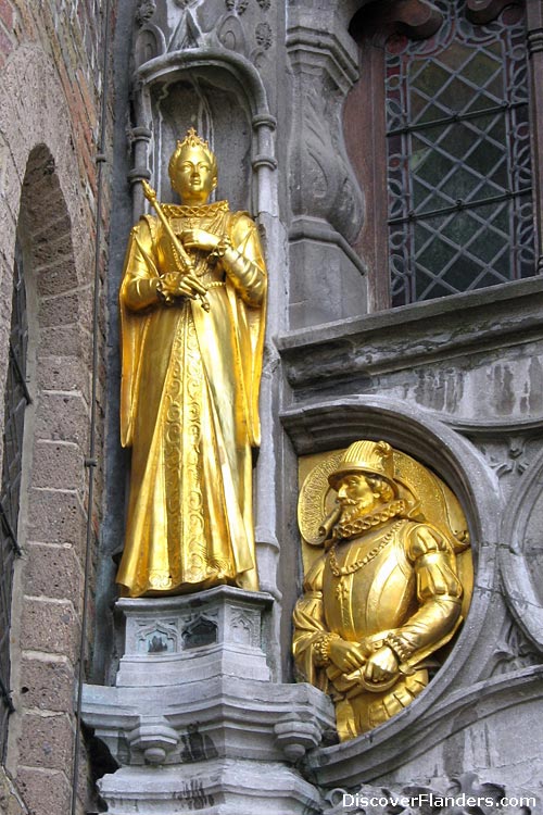 Gilded figures on the Basilica of the Holy Blood, Castle Square, Bruges.