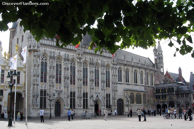 The Town Hall of Bruges in front, and the Basilica of the Holy Blood to the right. 
