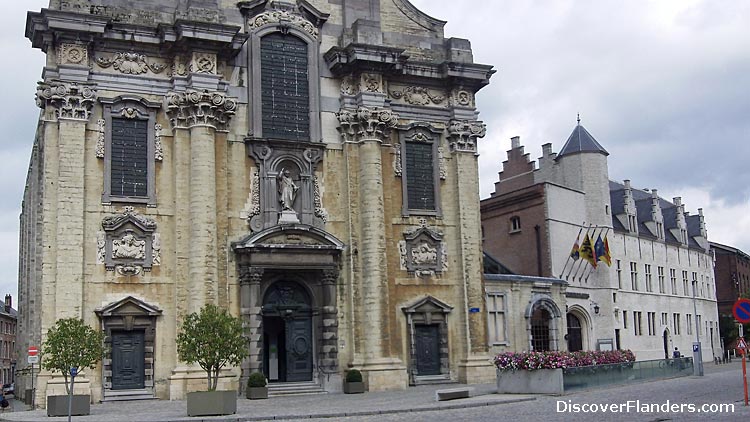 Church of Saint Peter and Saint Paul, with the Palace of Margaret of York to the right (now City Theatre). 